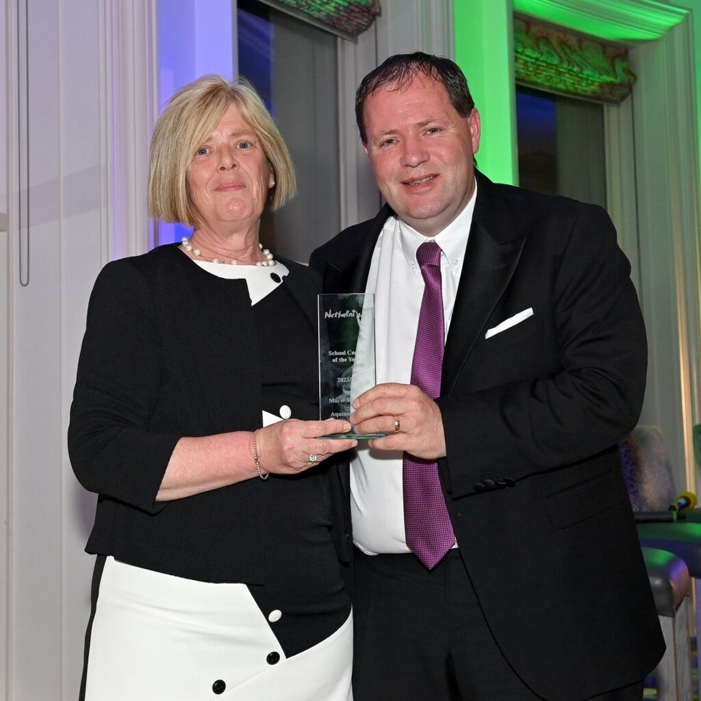 Jim Quinn, Company Director J&K Coaches Limited presenting an award at the Netball NI Awards, Galgorm Spa & Resort Ballymena
