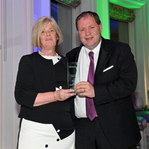 Jim Quinn, Company Director J&K Coaches Limited presenting an award at the Netball NI Awards, Galgorm Spa & Resort Ballymena